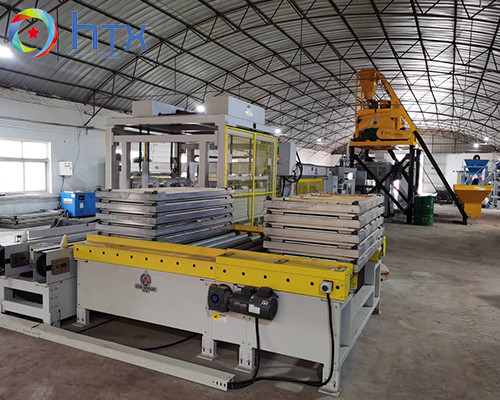 Système de dosage de béton coulé humide pour la machine de fabrication de pierre de Kerb