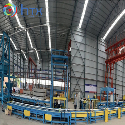 Machine automatique pour la fabrication de carreaux de béton