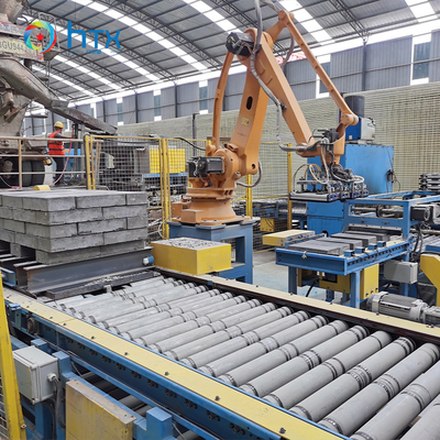 Ligne de production de blocs de maintien en béton