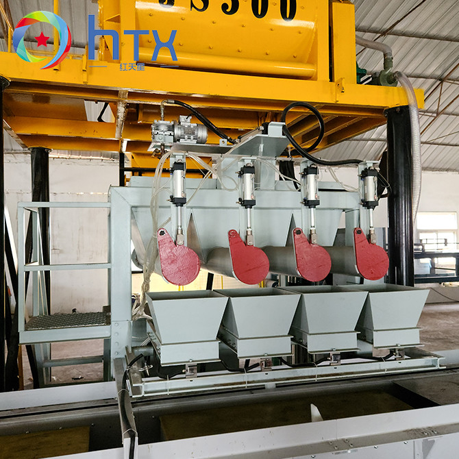 Machine de dosage automatique de béton mouillé en fonte ligne de production de pierre artificielle avec démoulage