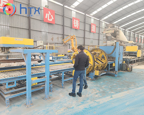 Ligne de production de panneaux muraux en pierre artificielle, machine à doser à coulée humide multifonctionnelle